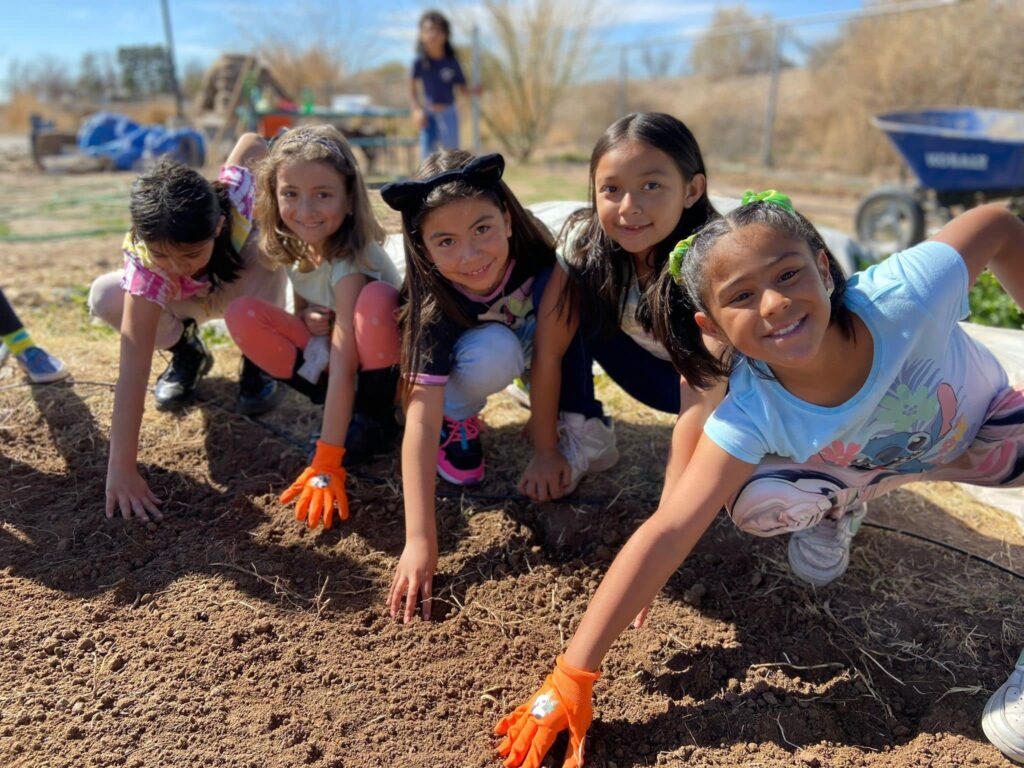 raices kids planting