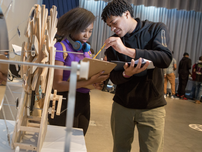 Two students working on a project together